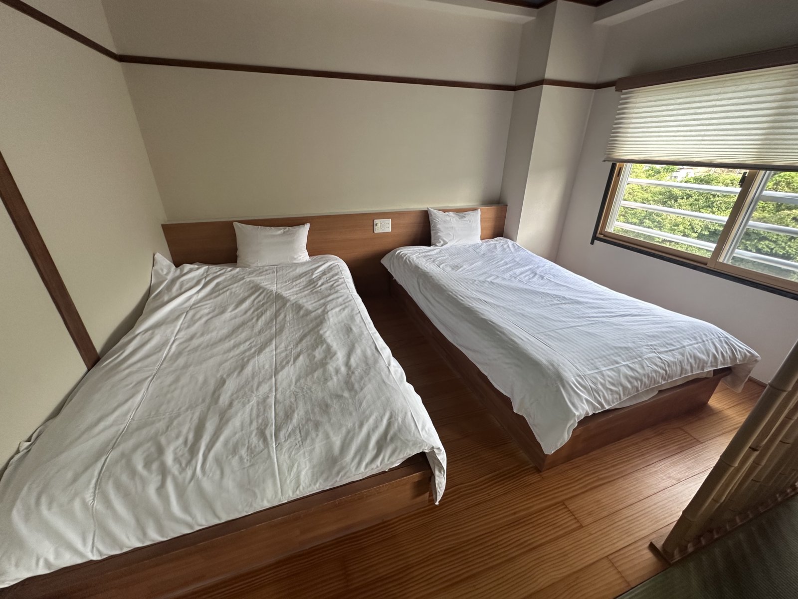 光陽閣の和洋室のベッド